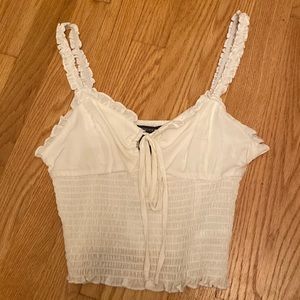 White forever 21 tank top. Tie in the center super cute.